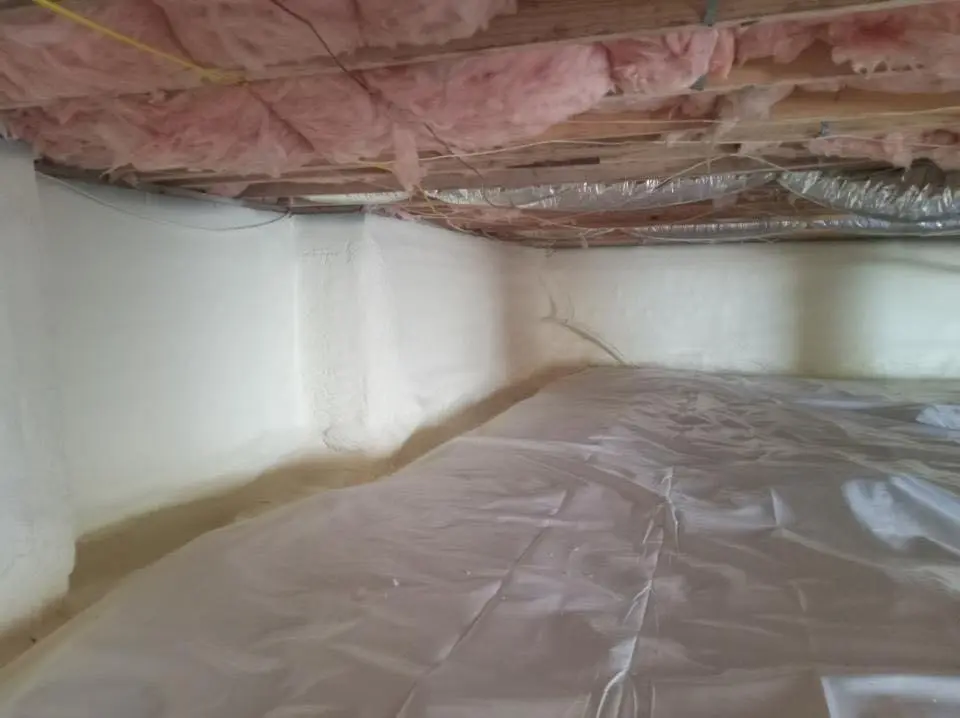 Crawl space encapsulation with closed-cell spray foam for Commercial Roof Restoration in Asbury